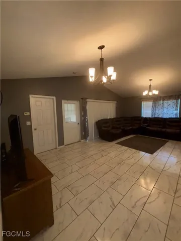 a kitchen with a sink and a refrigerator