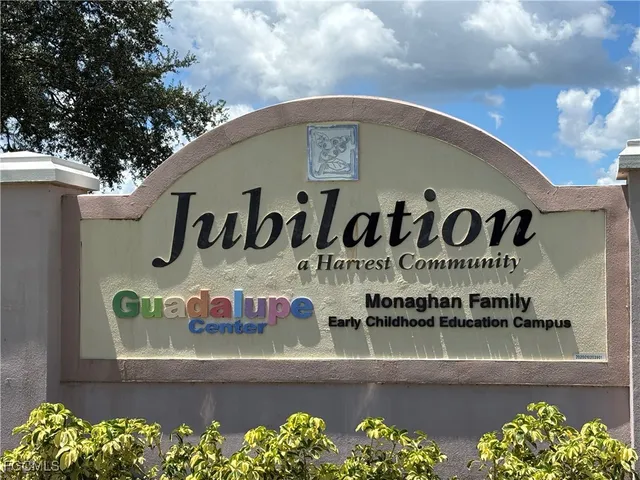 a view of a table and chairs in the garden