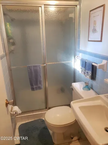 a close up view of a sink a washer and dryer