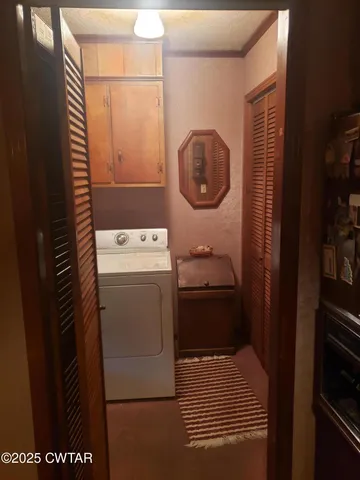 a view of a bathroom with a window