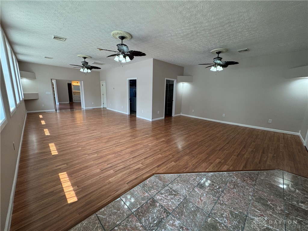 523 Newport Road Xenia, OH 45385 - Photo 8 of 43 Living room Dining room laundry and full bath leading to #2 master suite