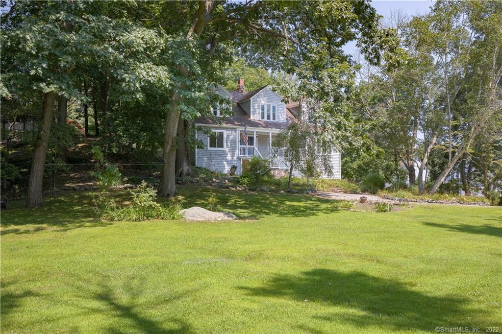 38 Shawandassee Road Waterford, CT 06385 - Photo 1 of 1 a front view of a house with a yard