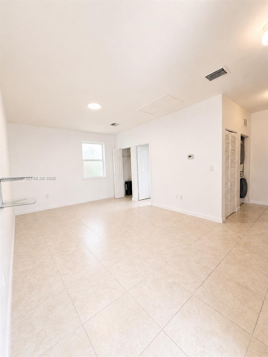 17001 Southwest 96th Street Miami, FL 33196 - Photo 19 of 23 a view of empty room with window
