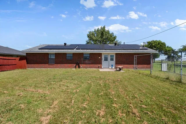 a front view of house with yard