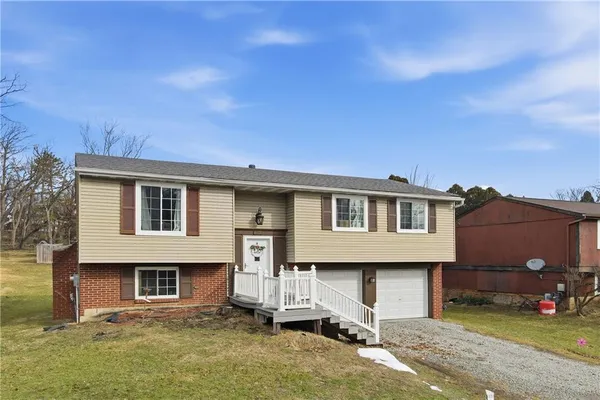 a view of a house with a patio