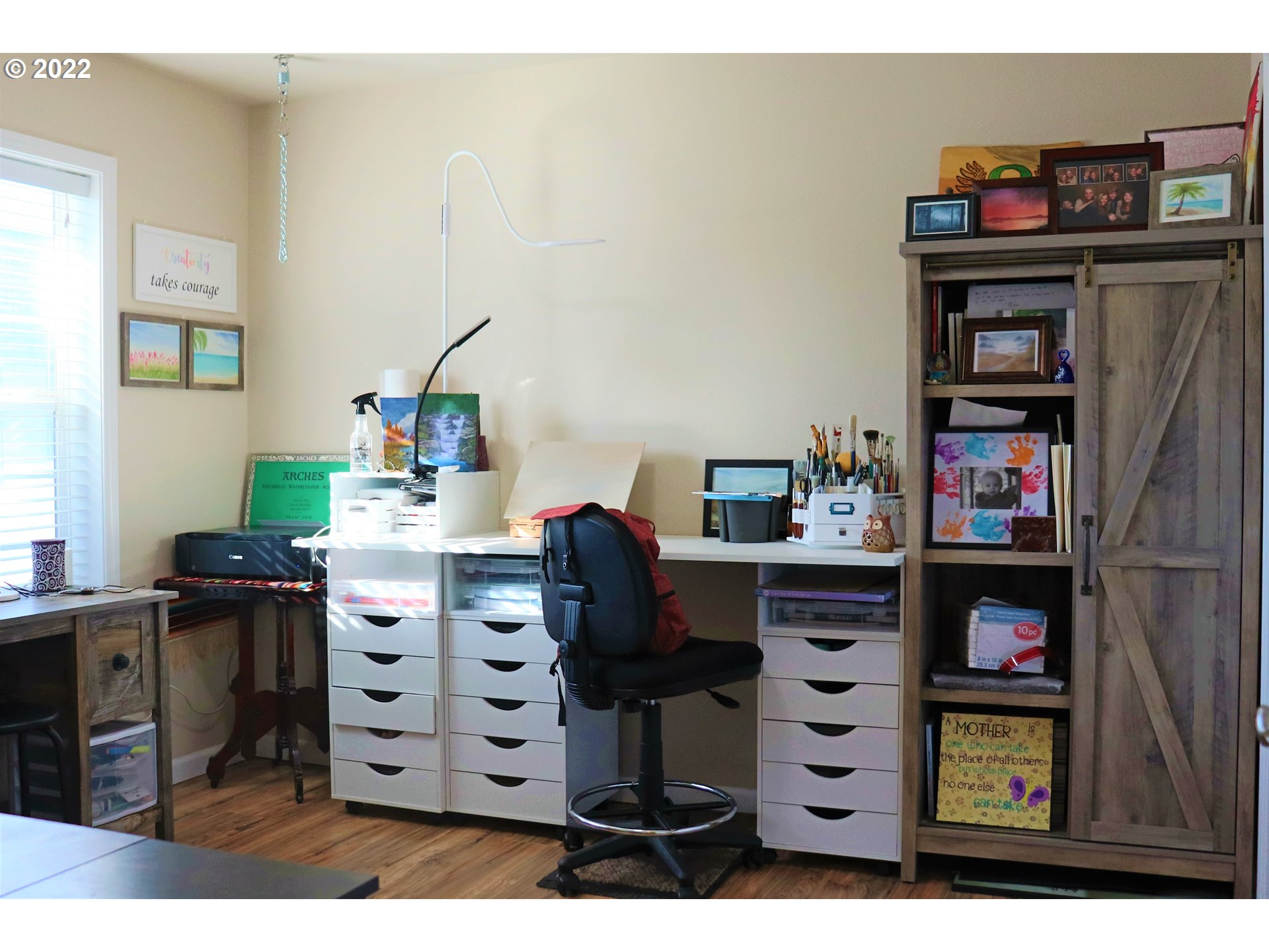 705 L Loop Baker City, OR 97814 - Photo 17 of 32 a bedroom with a bed and furniture