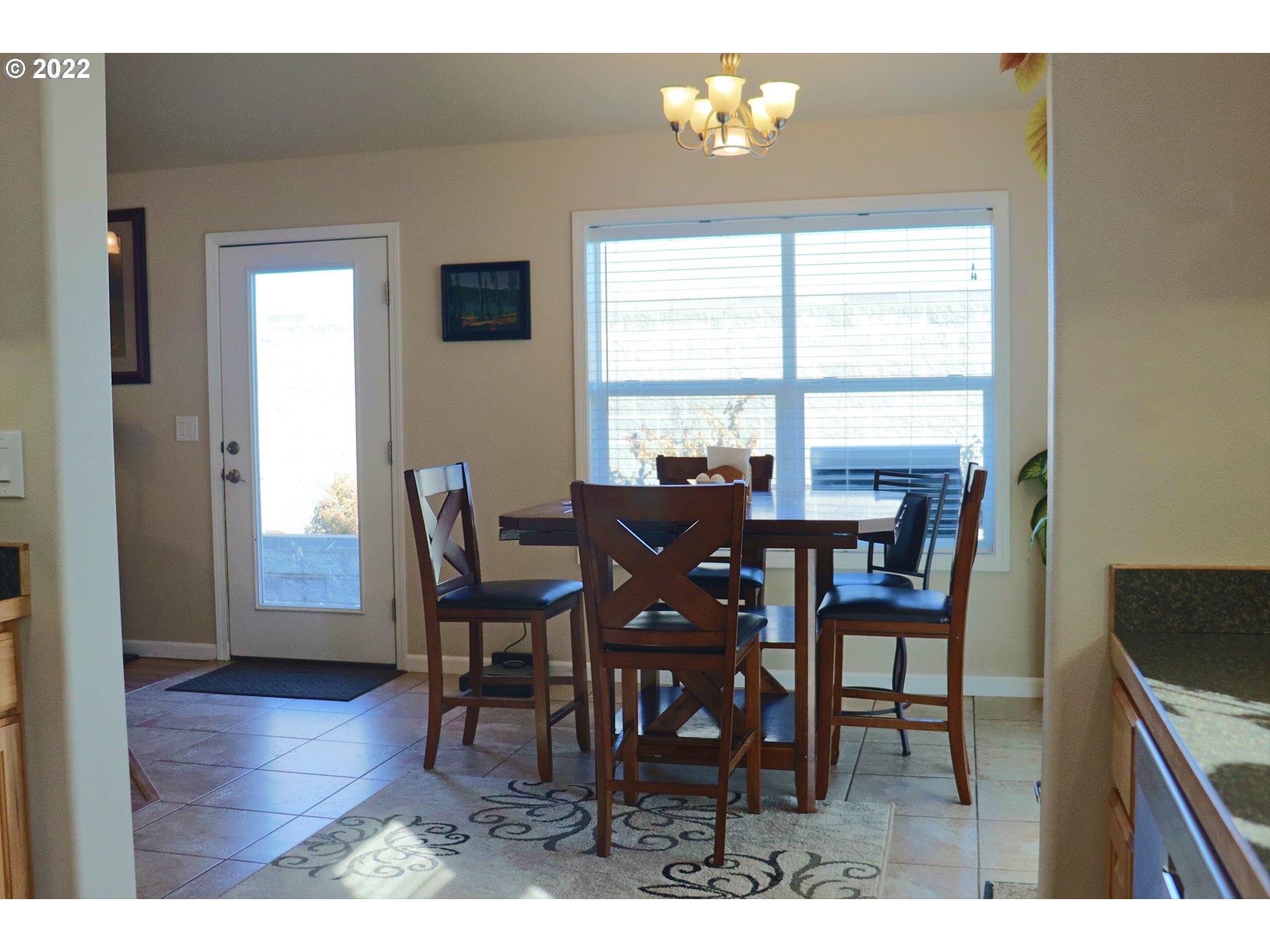 705 L Loop Baker City, OR 97814 - Photo 10 of 32 a view of a dining room with furniture and window