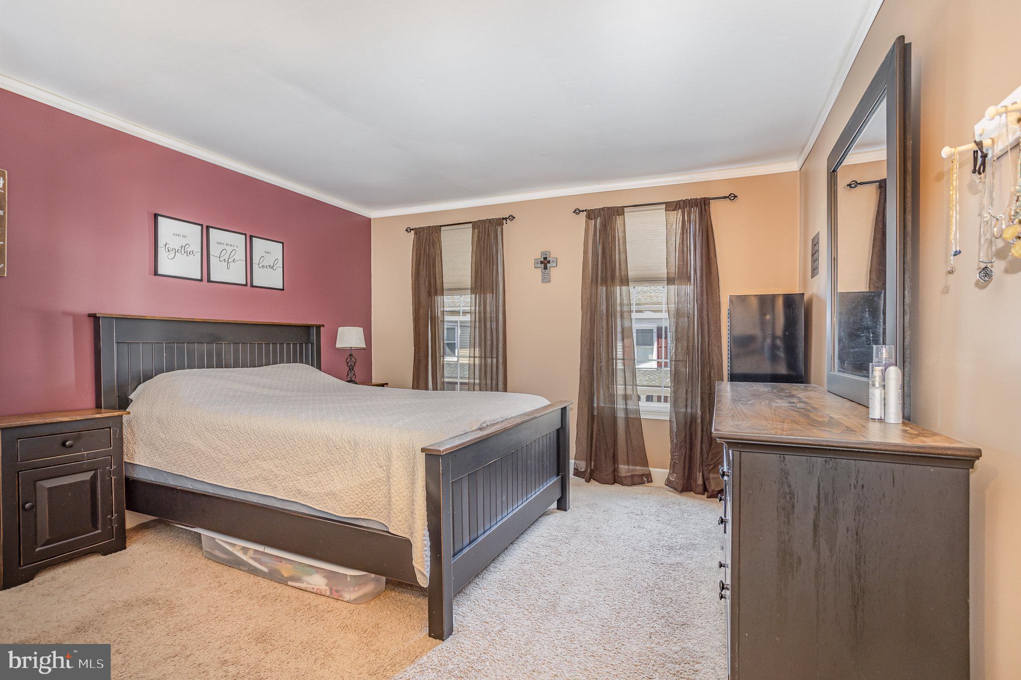 21 West Gramby Street Manheim, PA 17545 - Photo 16 of 36 a bedroom with a large bed and a window