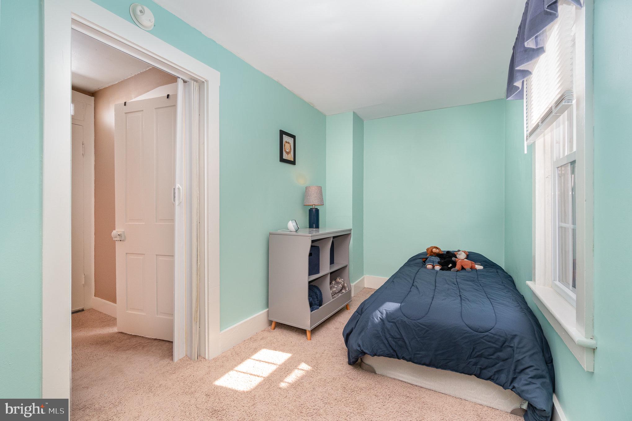 21 West Gramby Street Manheim, PA 17545 - Photo 21 of 36 a bedroom with a bed and a window