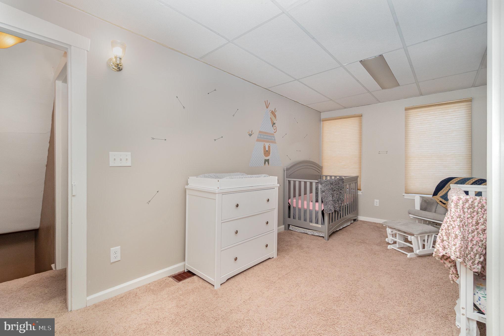 21 West Gramby Street Manheim, PA 17545 - Photo 22 of 36 a room with a baby bed baby crib furniture and a window