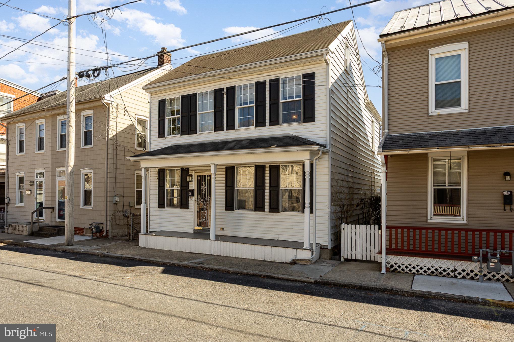 21 West Gramby Street Manheim, PA 17545 - Photo 3 of 36 a front view of a house with stairs