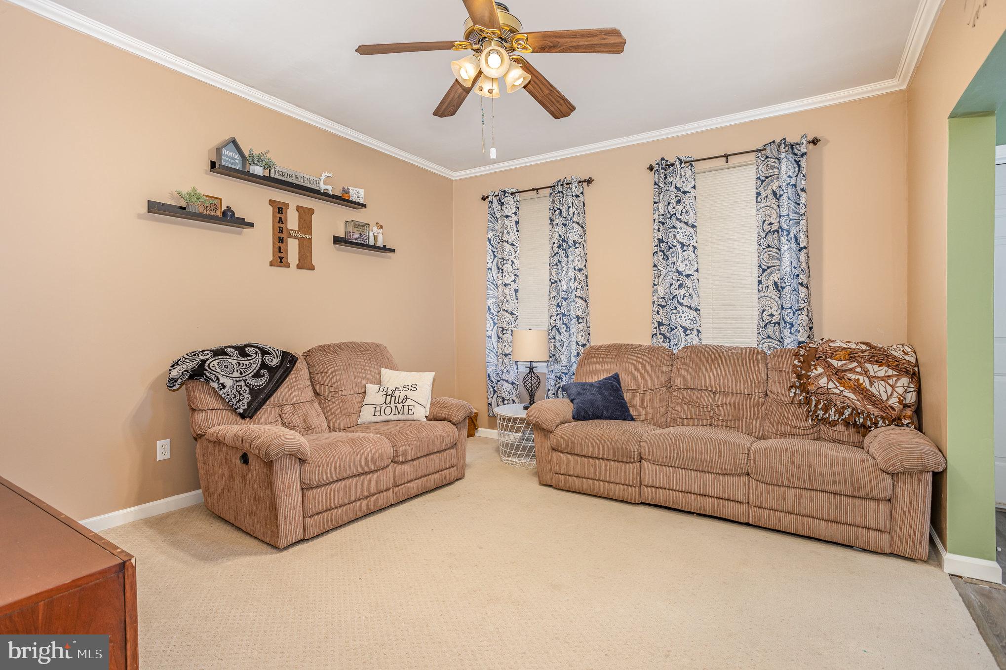 21 West Gramby Street Manheim, PA 17545 - Photo 8 of 36 a living room with furniture and a large window