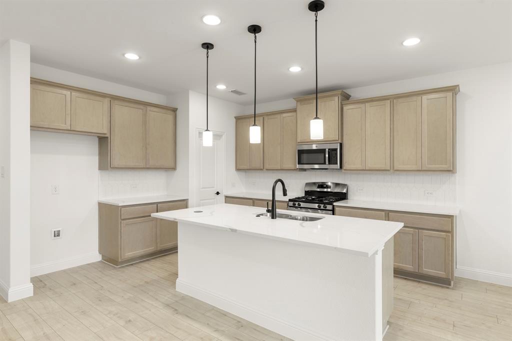 2902 Hanscom Street Forney, TX 75126 - Photo 2 of 34 kitchen