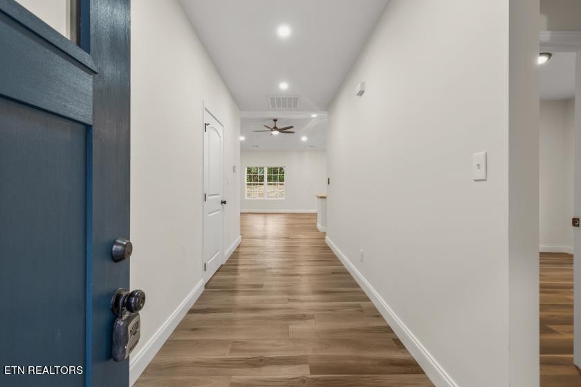 1937 River Poppy Road Mascot, TN 37806 - Photo 5 of 26 a view of a hallway with wooden floor and staircase