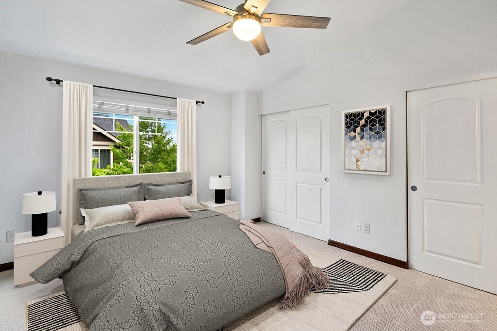 2923 Belmonte Lane Everett, WA 98201 - Photo 19 of 33 a bedroom with a large bed and a window