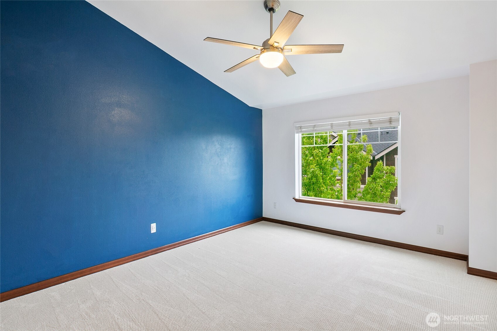 2923 Belmonte Lane Everett, WA 98201 - Photo 20 of 33 an empty room with windows fan and ceiling fan