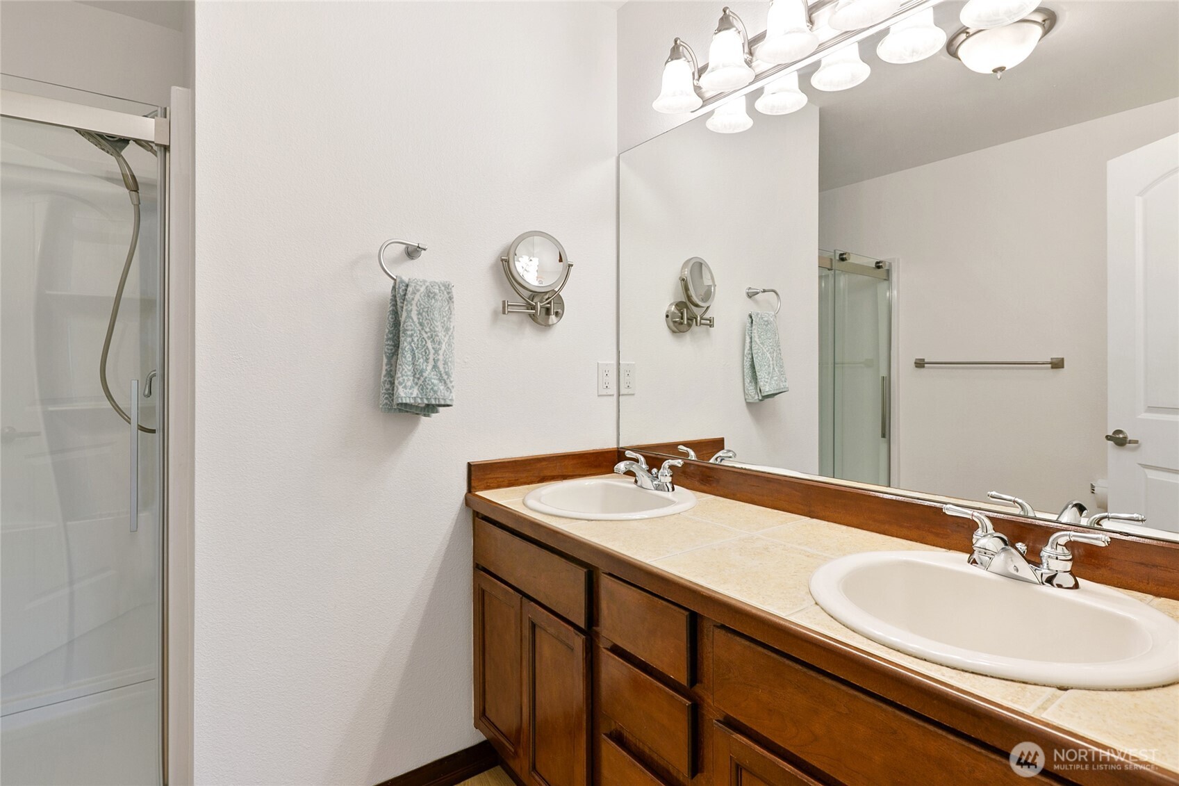 2923 Belmonte Lane Everett, WA 98201 - Photo 25 of 33 a bathroom with a sink vanity granite and a mirror