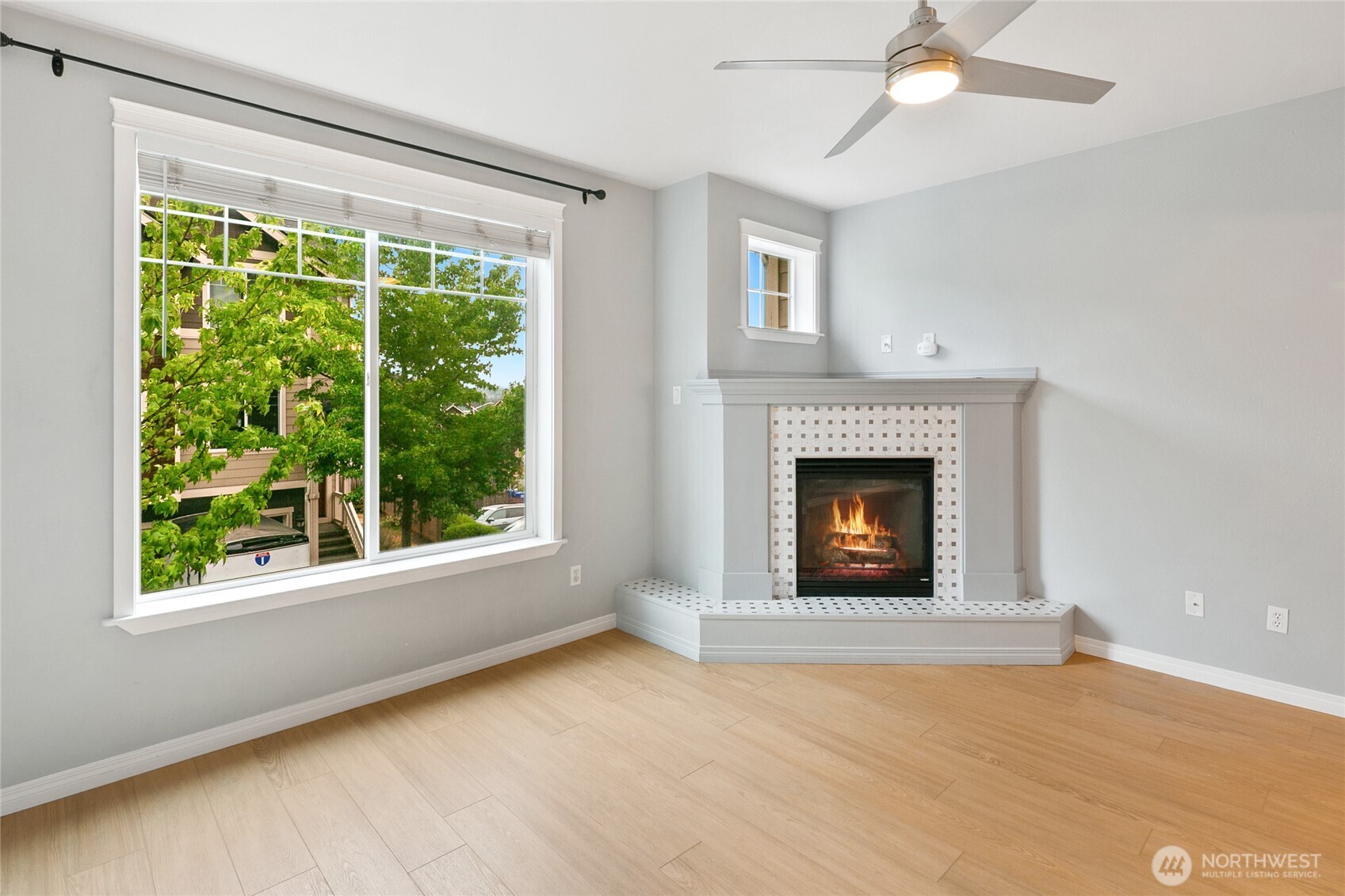 2923 Belmonte Lane Everett, WA 98201 - Photo 6 of 33 a view of an empty room with a fireplace and a window