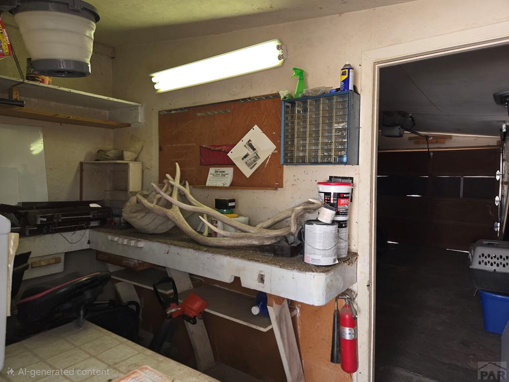 205 3rd Street Swink, CO 81077 - Photo 19 of 26 a kitchen with a sink and a stove top oven