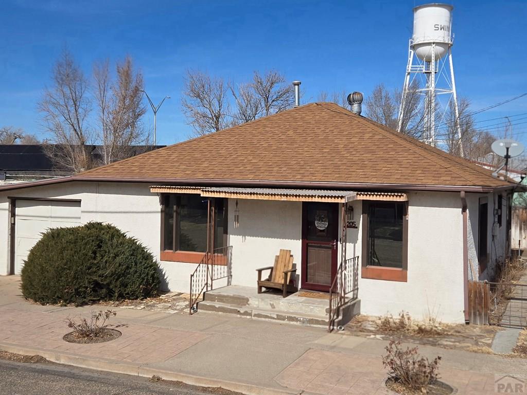 205 3rd Street Swink, CO 81077 - Photo 2 of 26 a view of a house with street