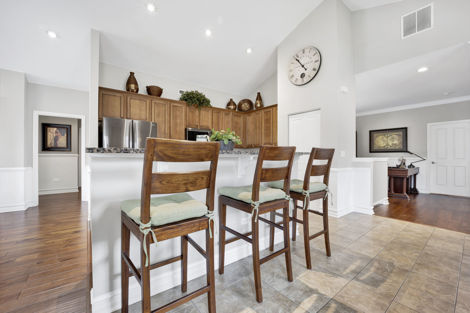 1914 Havenshire Road, Unit 1914 Aurora, IL 60502 - Photo 12 of 31 a dining room with furniture and wooden floor