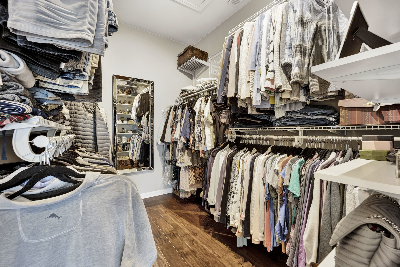 1914 Havenshire Road, Unit 1914 Aurora, IL 60502 - Photo 23 of 31 a view of walk in closet with clothes and shoes