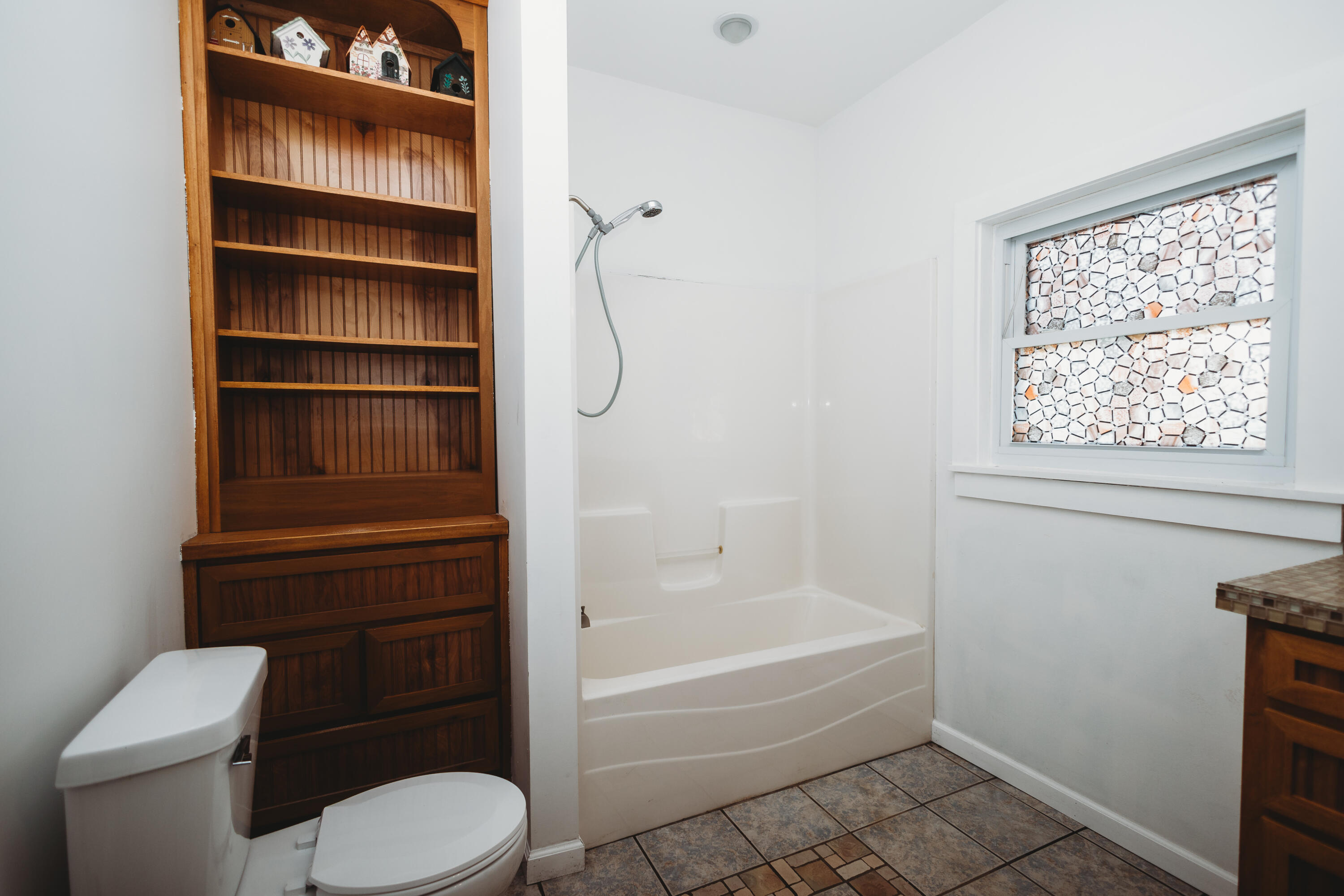 4812 East Bootjack Road Rolling Prairie, IN 46371 - Photo 8 of 13 a bathroom with a toilet and a bathtub