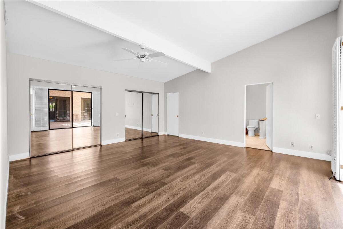 45 Lincoln Place Rancho Mirage, CA 92270 - Photo 27 of 59 a view of empty room with wooden floor and fan