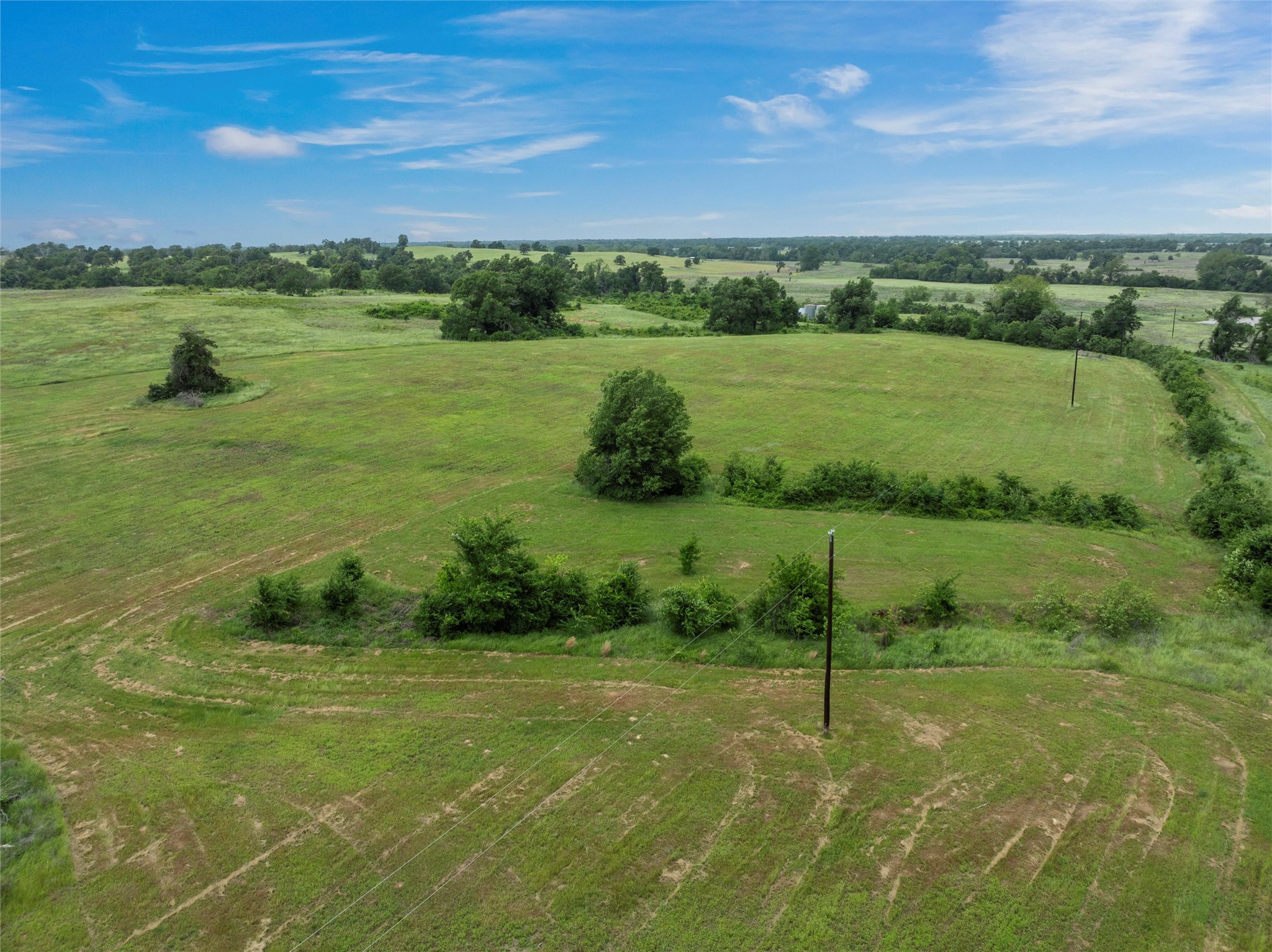 707 Lcr 707 Kosse, TX 76653 - Photo 13 of 15 a view of a lake with a yard