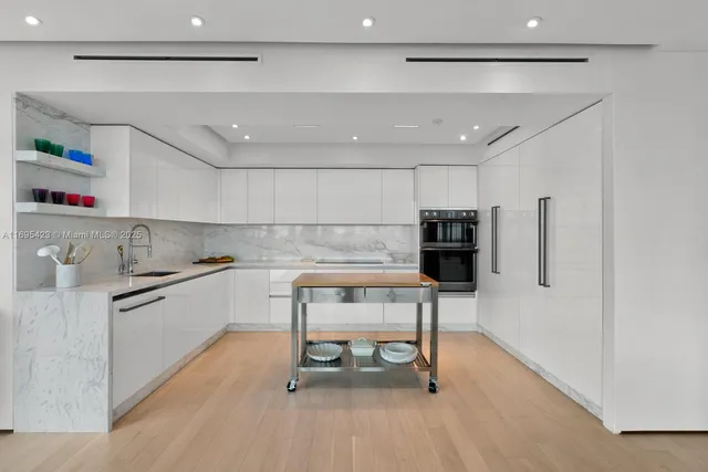 a kitchen with a sink cabinets and counter space