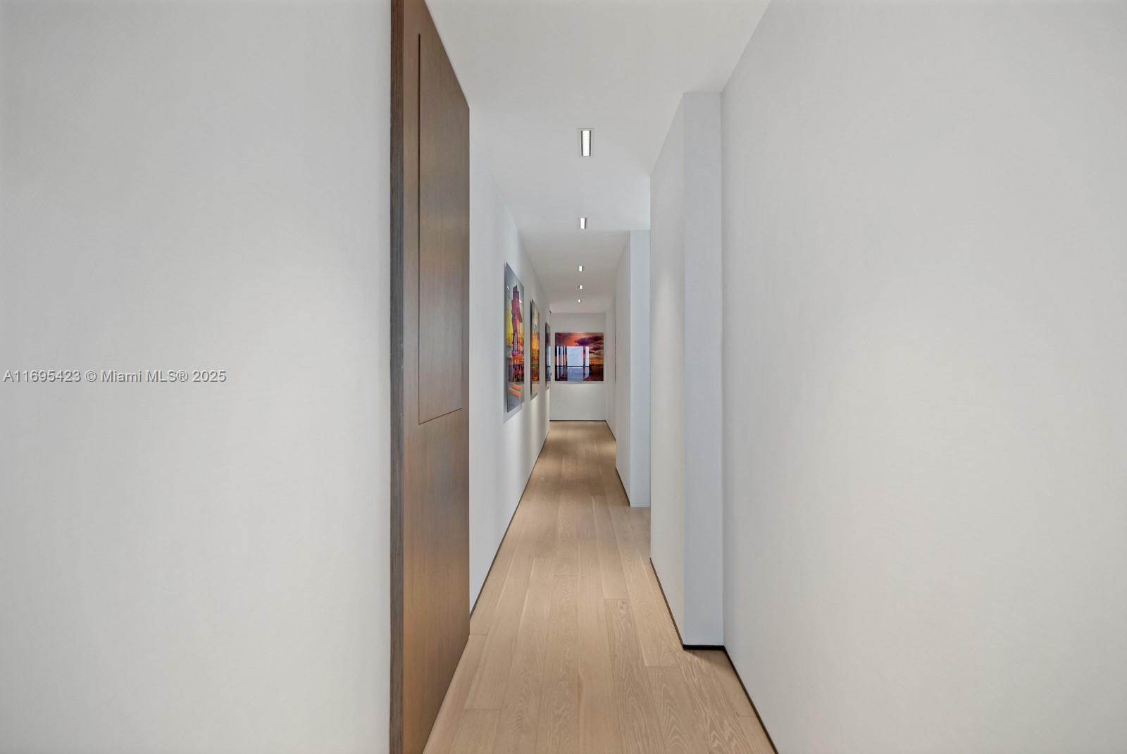 101 20th Street, Unit 3503/06/09 Miami Beach, FL 33139 - Photo 17 of 57 a view of a hallway with wooden walls