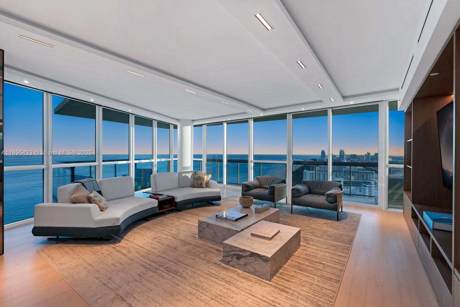 101 20th Street, Unit 3503/06/09 Miami Beach, FL 33139 - Photo 3 of 57 a living room with furniture and a flat screen tv