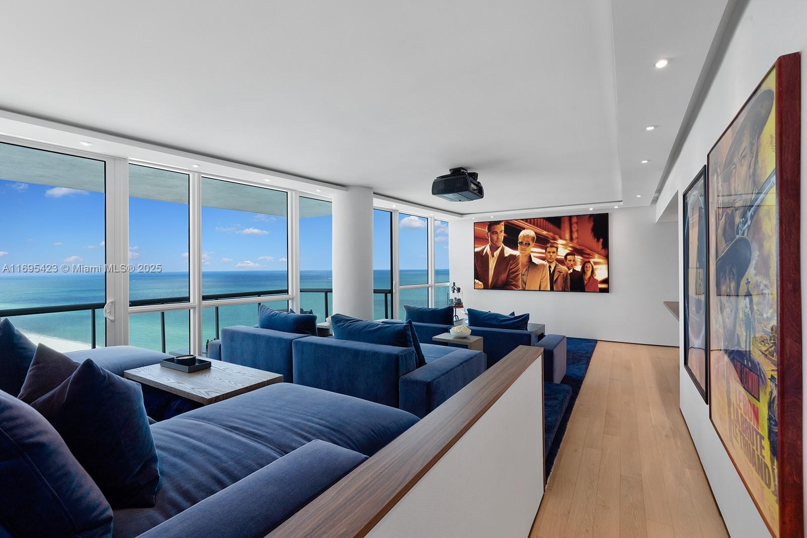 101 20th Street, Unit 3503/06/09 Miami Beach, FL 33139 - Photo 32 of 57 a living room with furniture and a large window