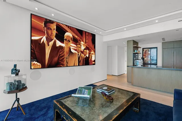 a view of balcony with wooden floor and seating space