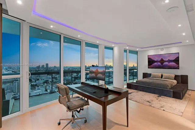 a view of roof deck with two chairs and wooden floor
