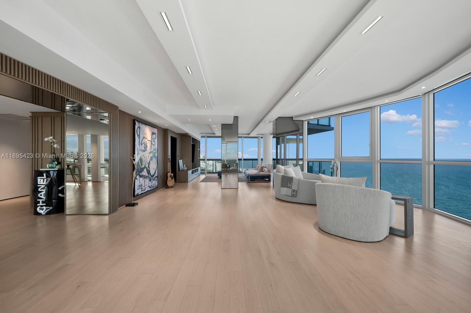 101 20th Street, Unit 3503/06/09 Miami Beach, FL 33139 - Photo 9 of 57 a living room with furniture and a table