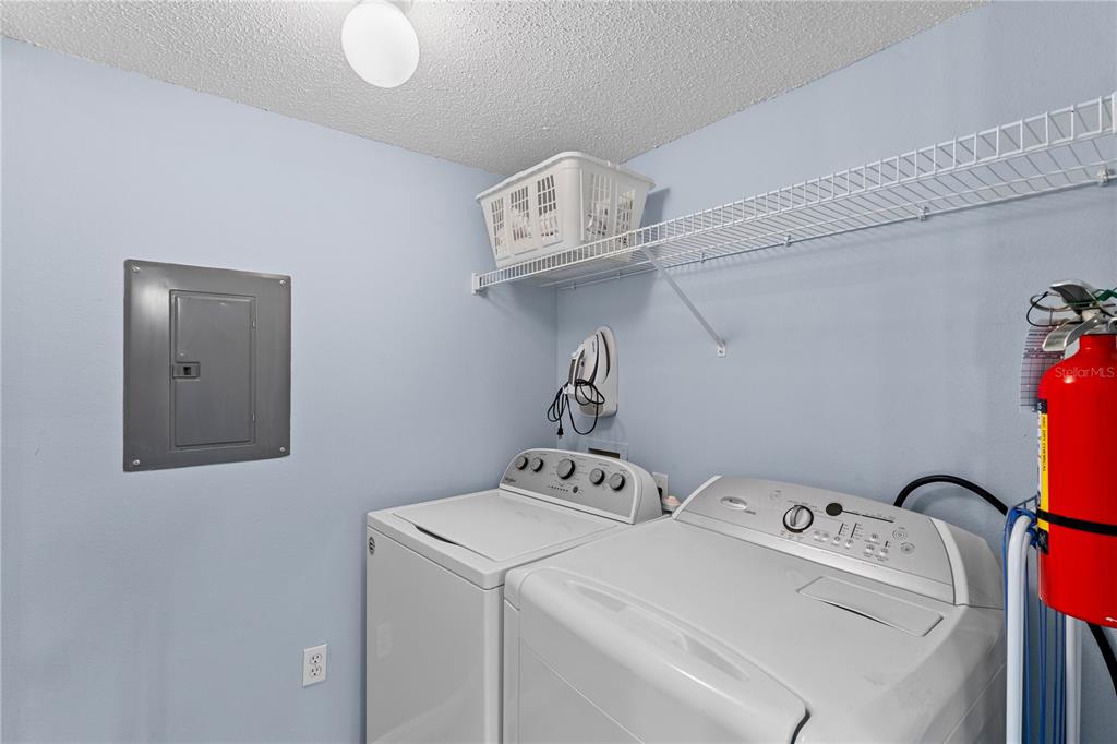 1017 Park Ridge Circle Kissimmee, FL 34746 - Photo 14 of 52 a utility room with dryer and washer