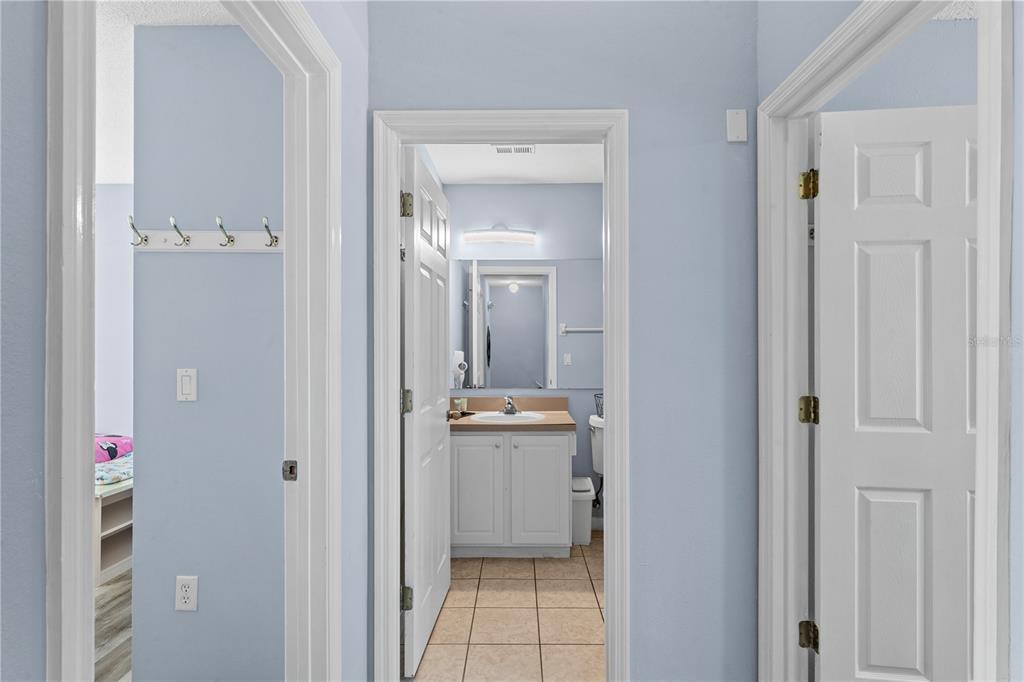 1017 Park Ridge Circle Kissimmee, FL 34746 - Photo 15 of 52 a view of a bathroom from a hallway