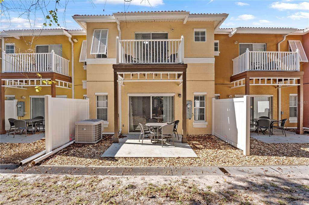 1017 Park Ridge Circle Kissimmee, FL 34746 - Photo 27 of 52 a view of a building with a patio