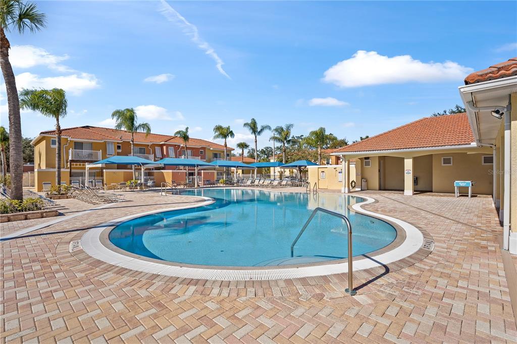 1017 Park Ridge Circle Kissimmee, FL 34746 - Photo 40 of 52 a view of a swimming pool with a patio