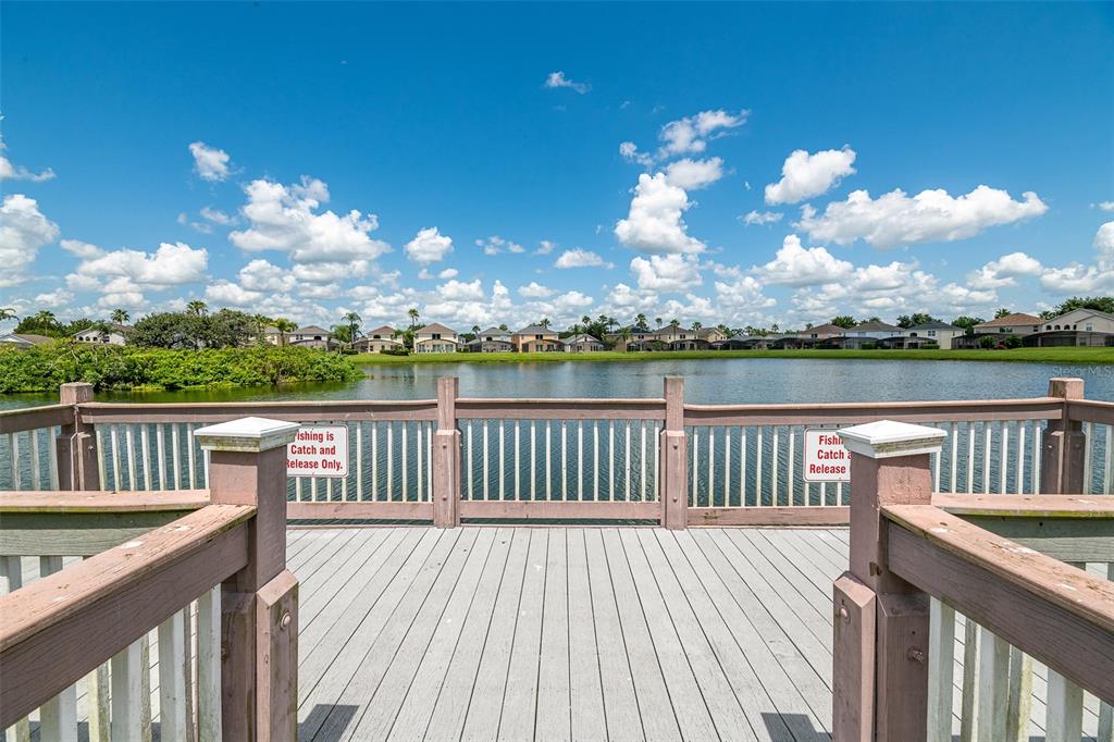 1017 Park Ridge Circle Kissimmee, FL 34746 - Photo 52 of 52 a view of a balcony with wooden floor