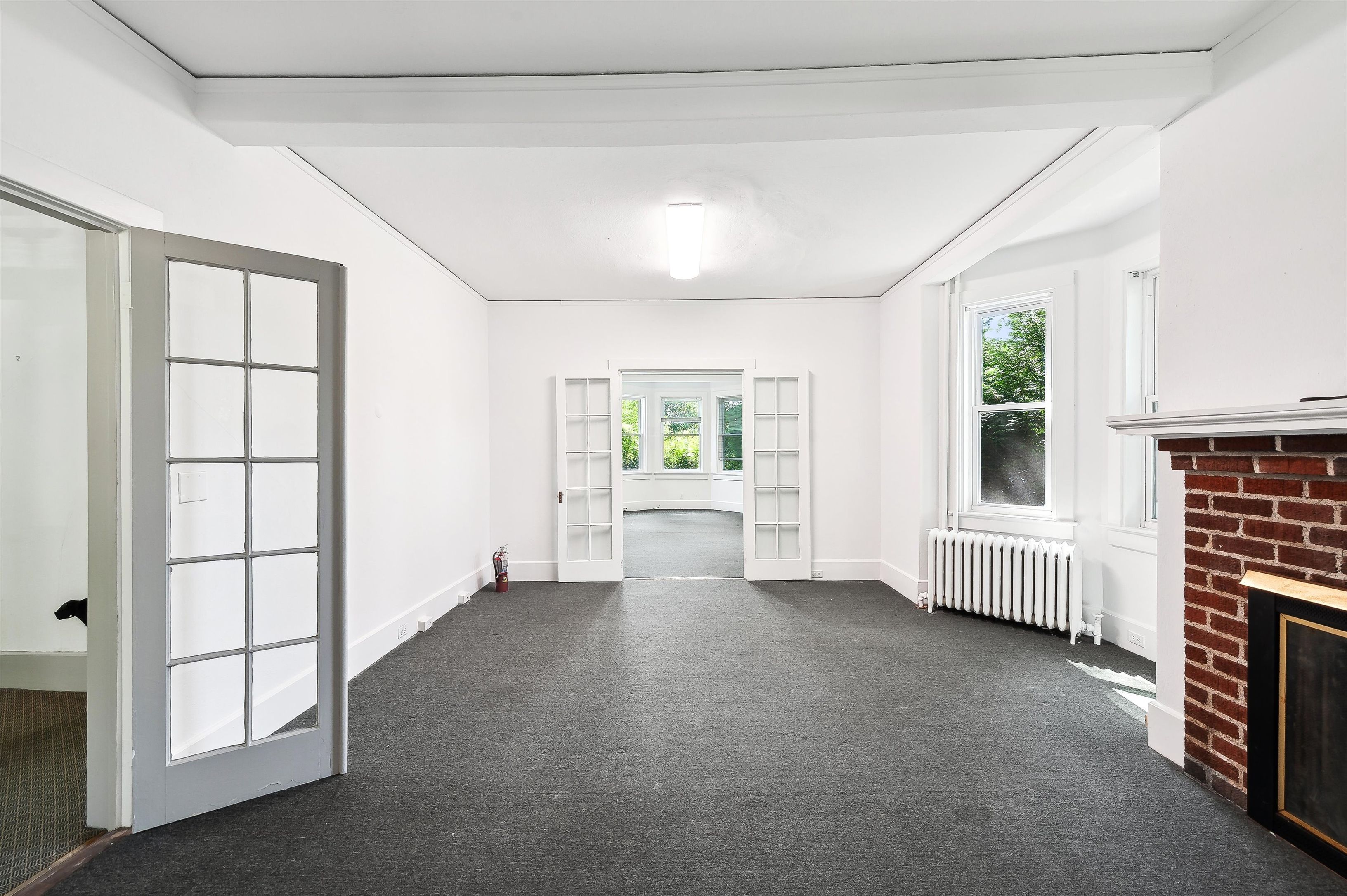 10 Pantigo Road East Hampton, NY 11937 - Photo 11 of 28 an empty room with windows and closet
