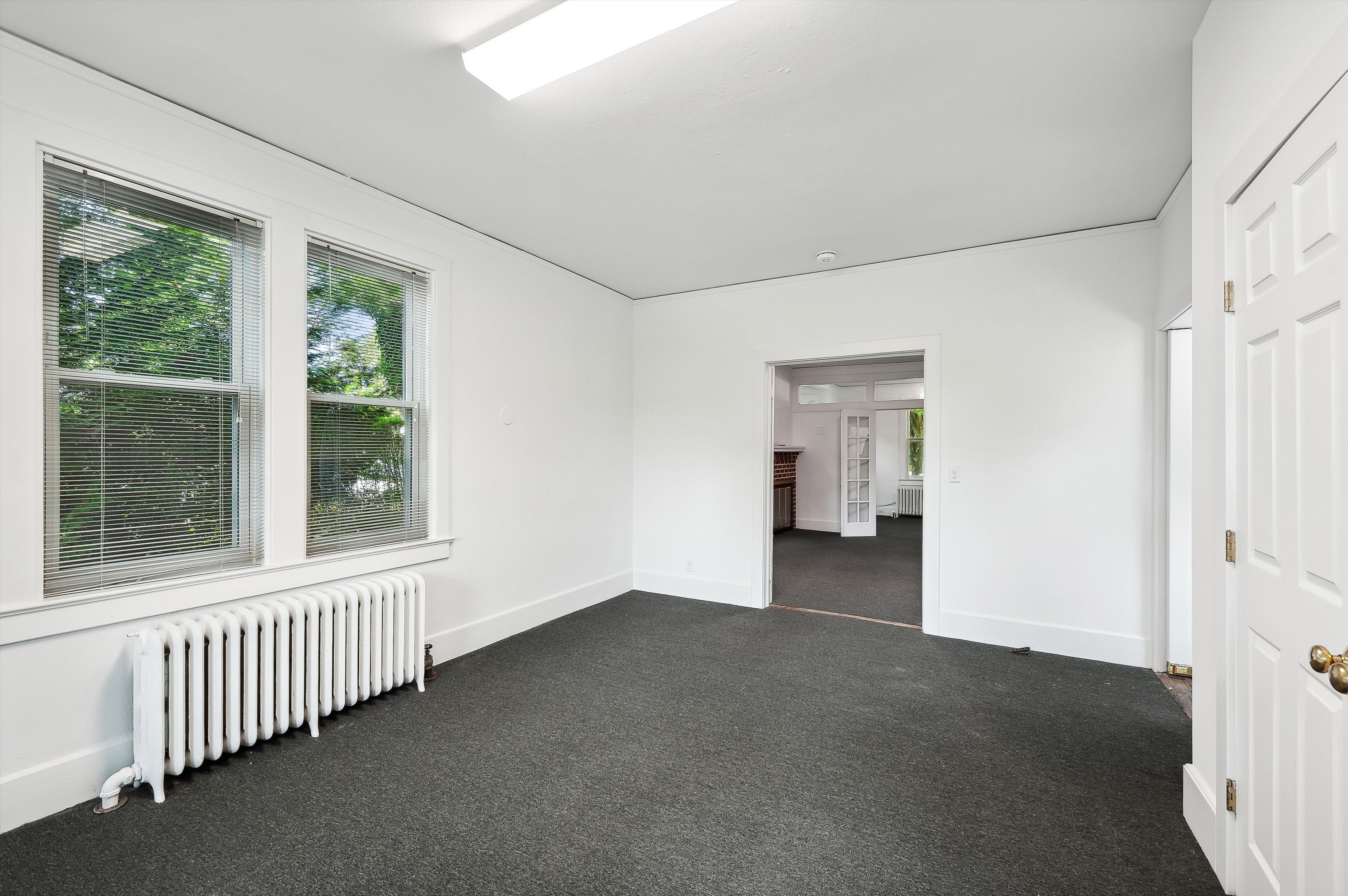 10 Pantigo Road East Hampton, NY 11937 - Photo 12 of 28 a view of an empty room with a window
