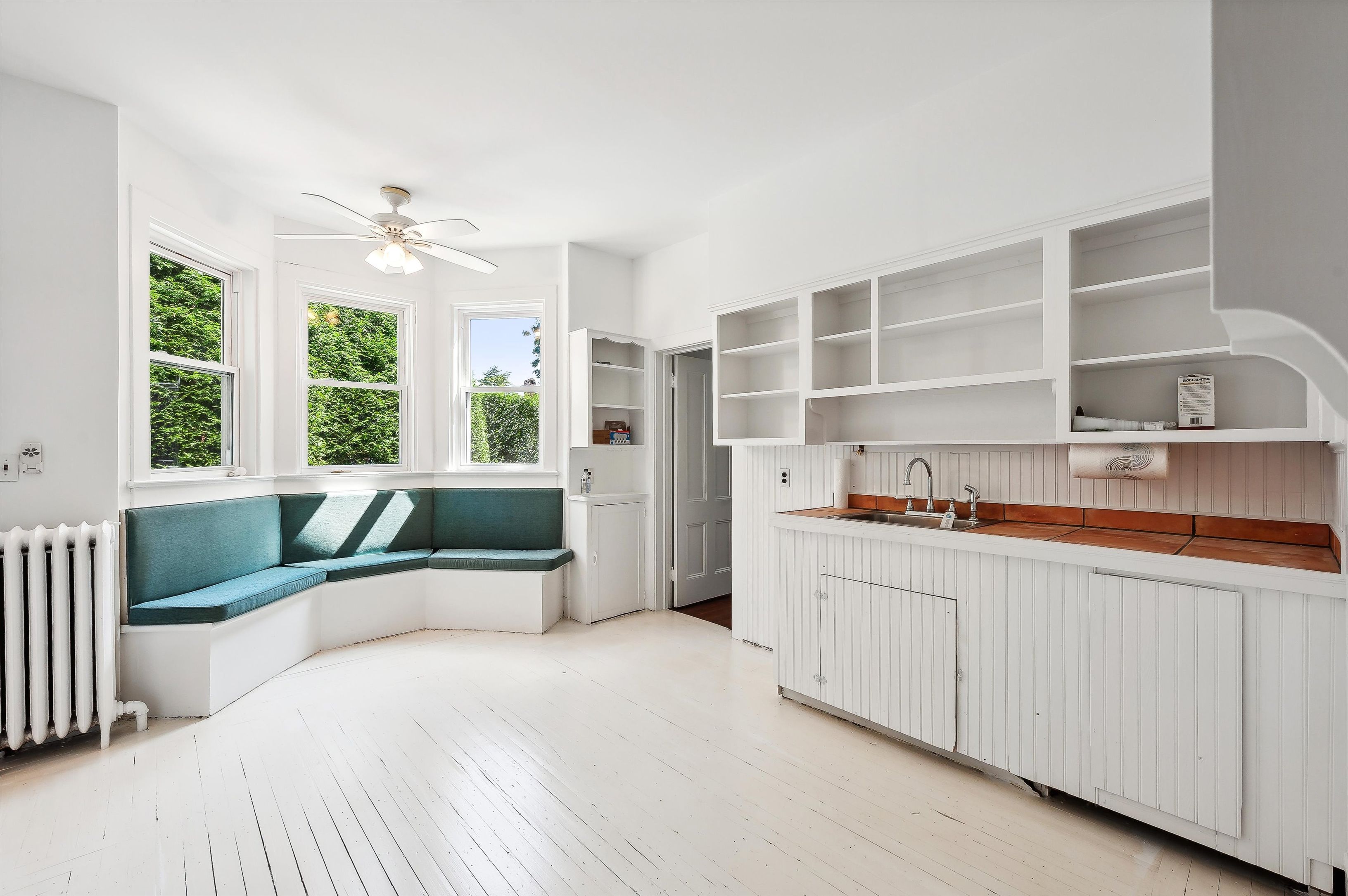 10 Pantigo Road East Hampton, NY 11937 - Photo 16 of 28 a spacious bedroom with a large bed and a window