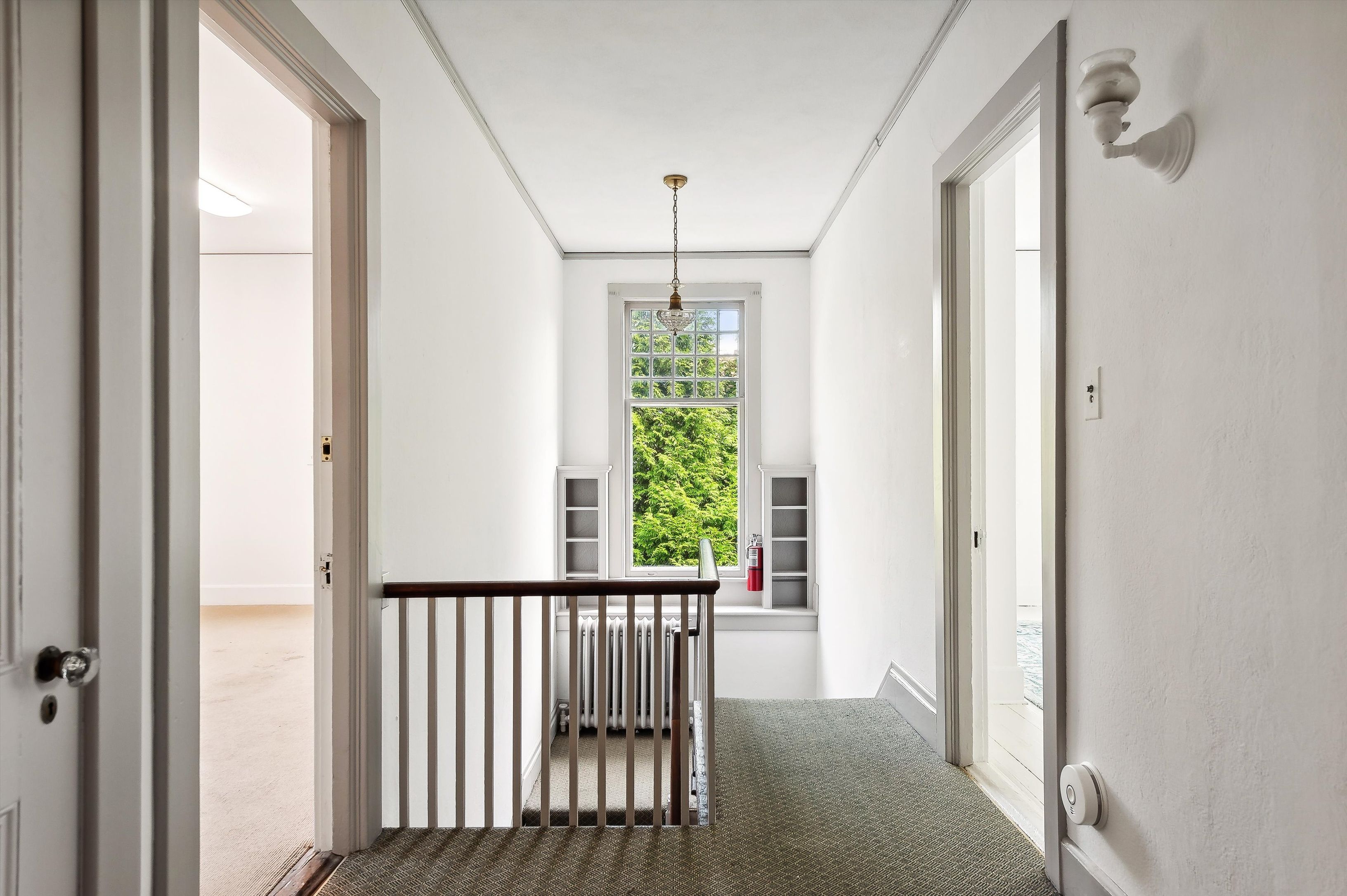10 Pantigo Road East Hampton, NY 11937 - Photo 18 of 28 a view of a hallway with windows