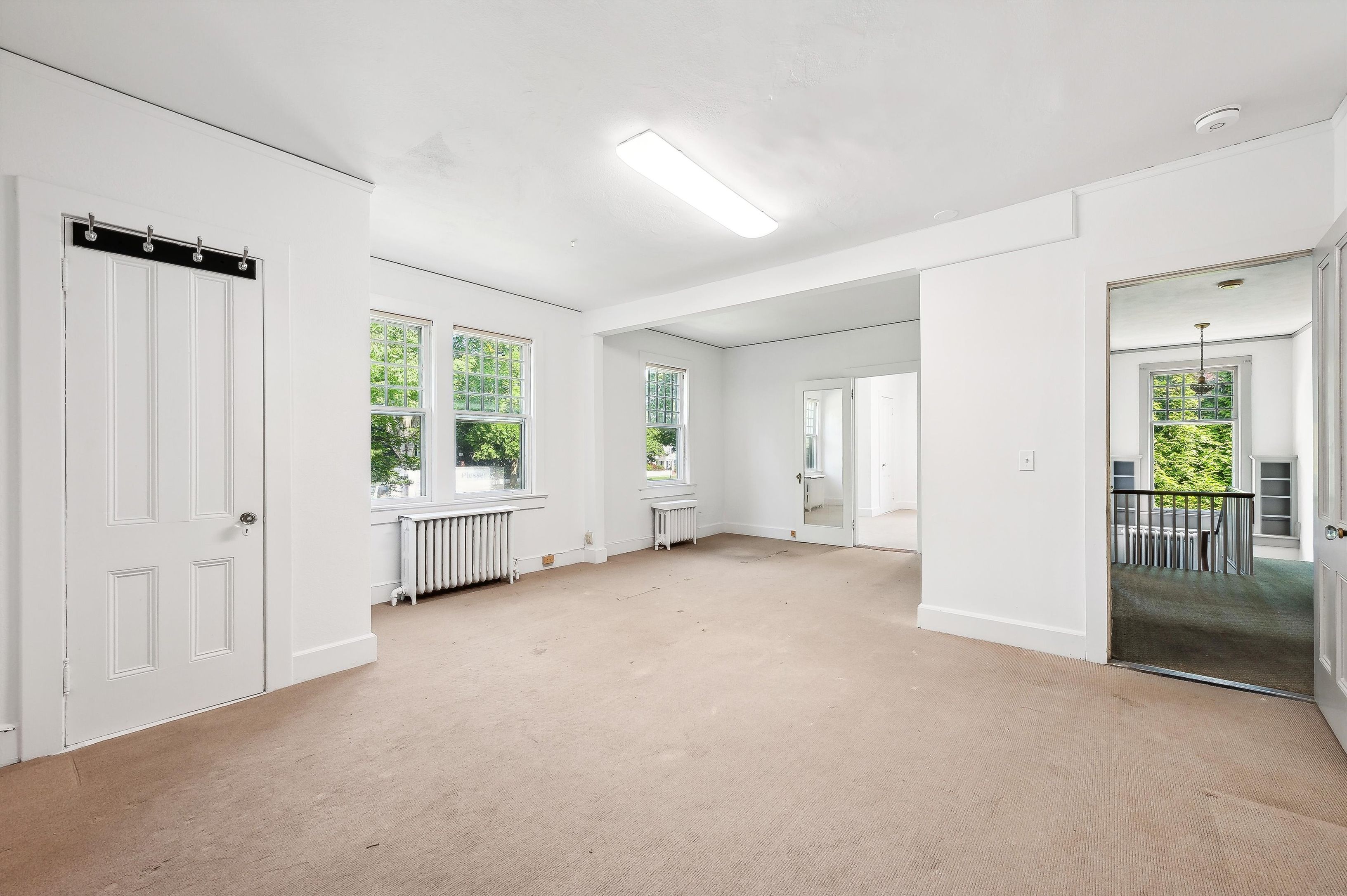 10 Pantigo Road East Hampton, NY 11937 - Photo 19 of 28 an empty room with windows and closet