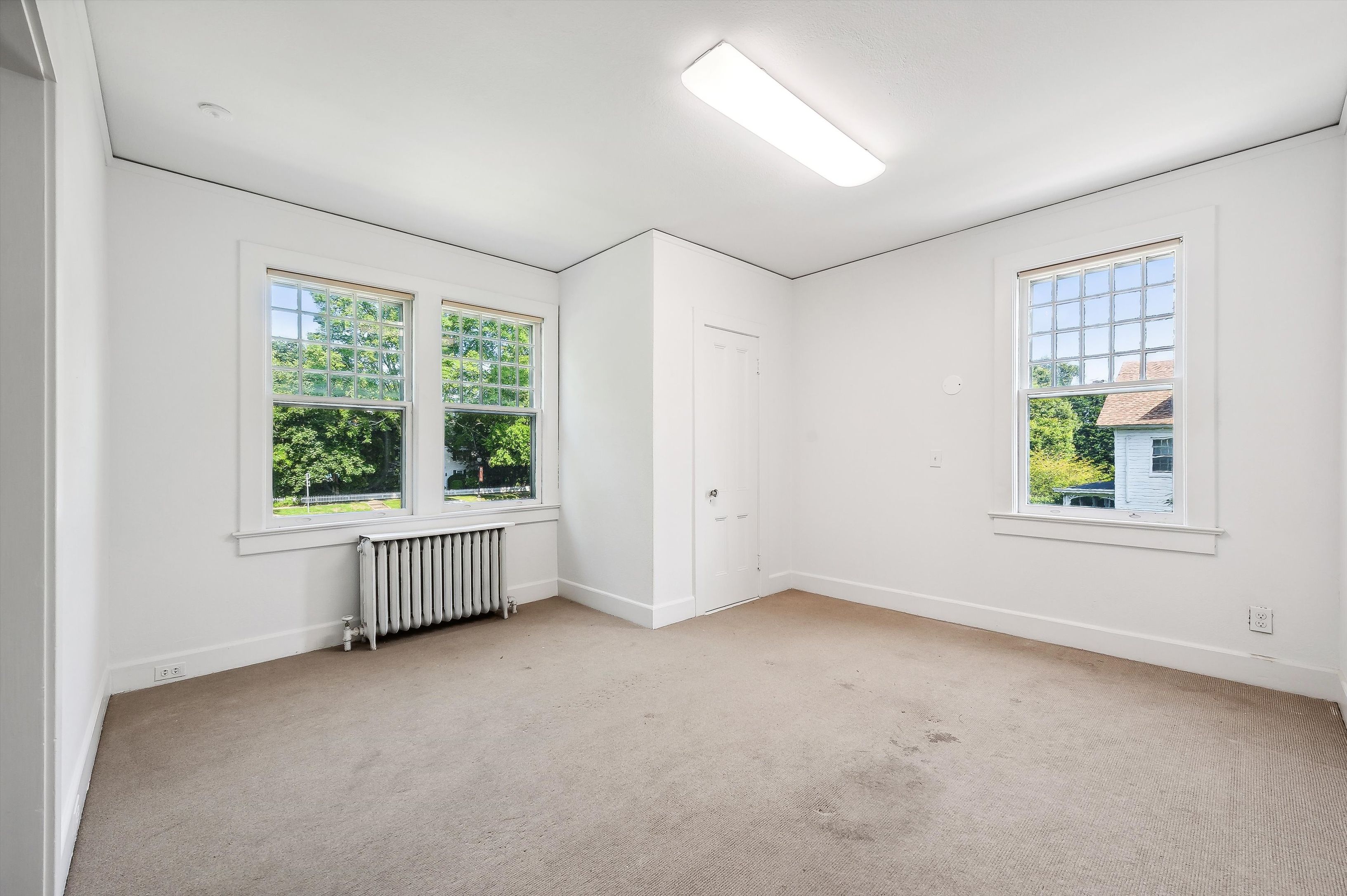 10 Pantigo Road East Hampton, NY 11937 - Photo 20 of 28 an empty room with windows
