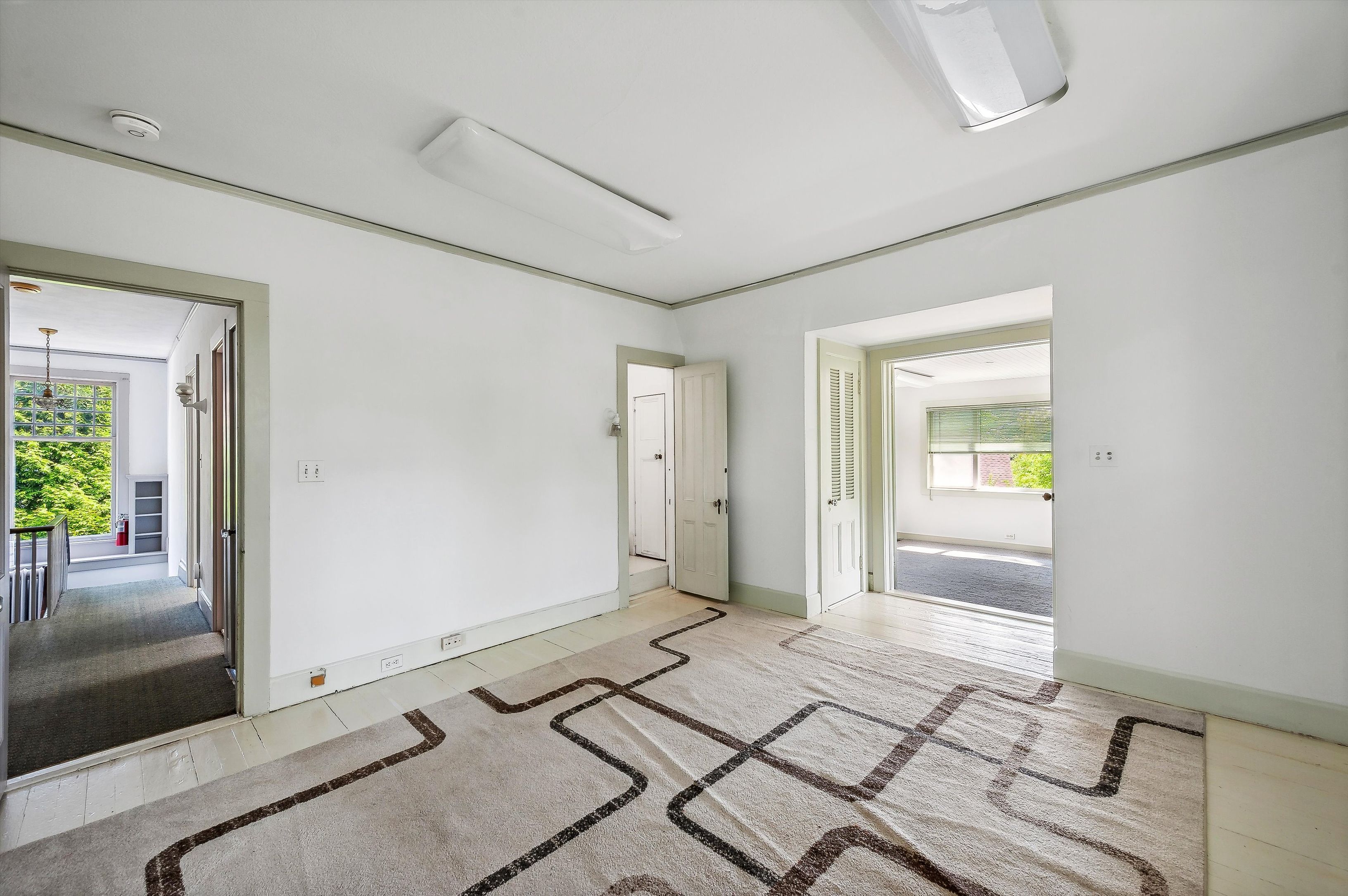 10 Pantigo Road East Hampton, NY 11937 - Photo 21 of 28 a bedroom with a bed and a window