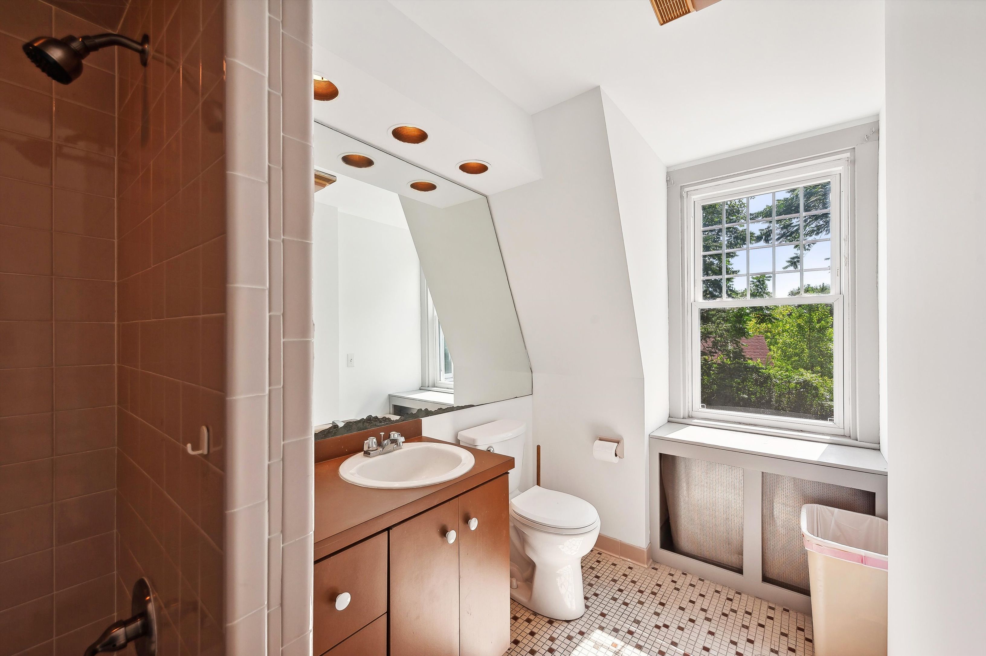 10 Pantigo Road East Hampton, NY 11937 - Photo 27 of 28 a bathroom with a sink toilet a mirror and shower