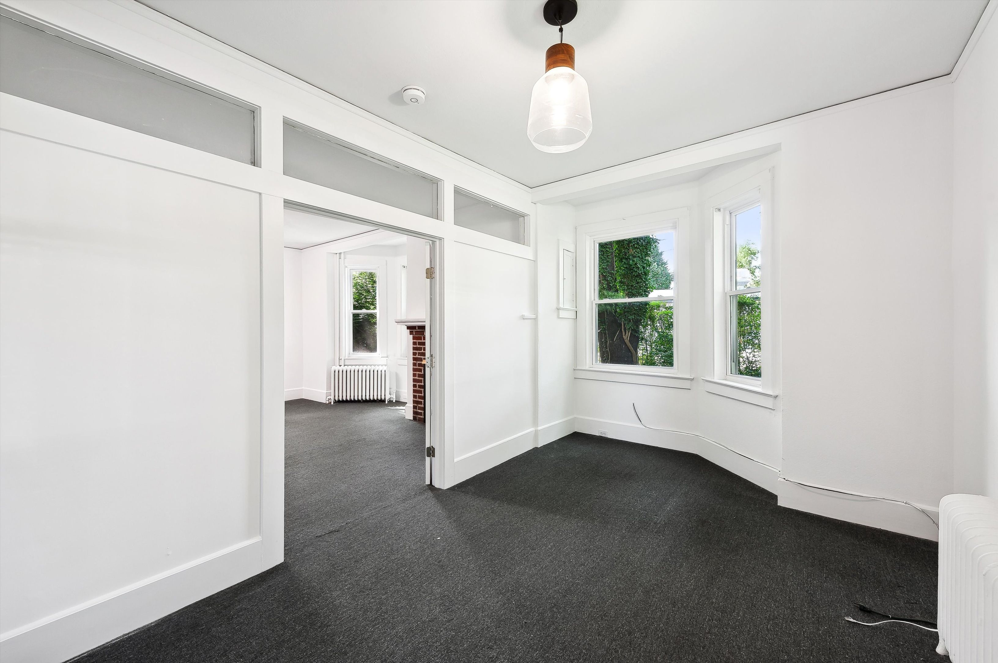 10 Pantigo Road East Hampton, NY 11937 - Photo 9 of 28 a view of a livingroom with an empty space and a window